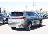 Experience comfort, versatility, and confident all-wheel-drive performance in this 2023 Hyundai Sant... (image 3)