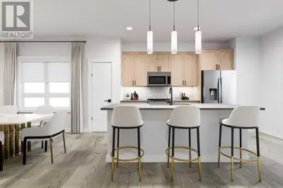 GORGEOUS VIEWS FROM THE NEW COMMUNITY OF ALPINE PARK!! Welcome to the Auburn 2 end-unit townhome in...