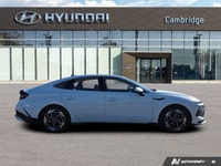 The 2024 Hyundai Sonata Preferred-Trend AWD, finished in pristine Serenity White with a sophisticate... (image 5)