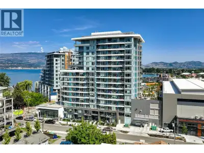 EXCEPTIONAL VALUE AT AQUA WATERFRONT. This 8th-floor corner unit is a ""must-see"" for the discernin...