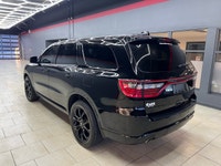Experience the bold presence and versatility of the 2019 Dodge Durango GT in striking black with an... (image 9)