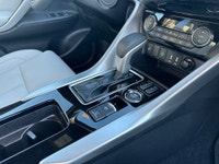 The 2025 Mitsubishi Eclipse Cross GT, bathed in a striking finish, is designed to handle diverse ter... (image 9)