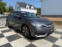 A modern compact sedan with upgraded convenience features, efficient performance, and a comfortable... (image 2)