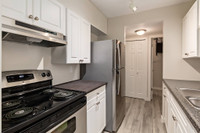 Amenities: Air Conditioning • Spacious Rooms • Heat & Water Included Suite & Building: Bachelor, one... (image 4)