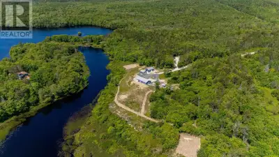 Accessible Waterfront Bungalow on 29.8 Private Acres with approximately 3000 ft of River/Lake fronta...