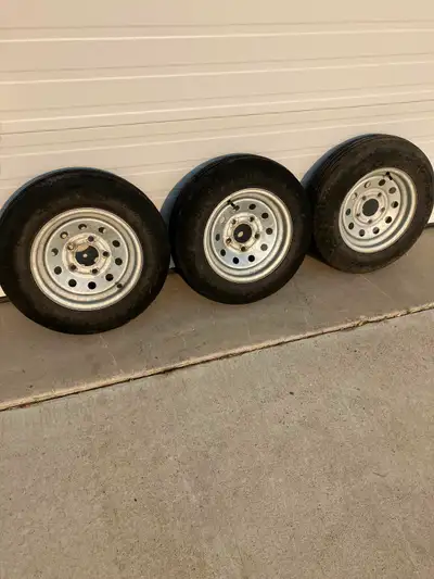 3 —5.3 x 12” tires/ galvanized rims for sale. 1 is brand new, 1 has 1000km and the other one is abou...