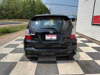 A practical subcompact hatchback with excellent fuel efficiency, easy maneuverability, and a surpris... (image 4)