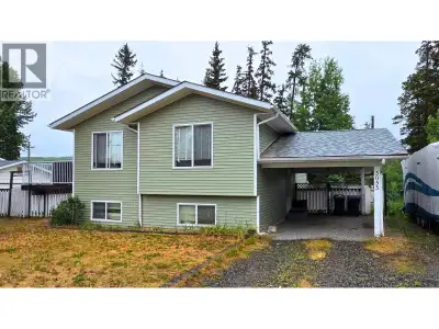 1997 built 5-bedroom family home on Huge private lot! The back property line stretches all the way d...