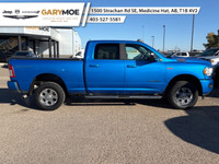The 2021 Ram 2500 Big Horn 4x4 Crew Cab is a powerhouse wrapped in a stunning blue exterior. Coupled... (image 1)