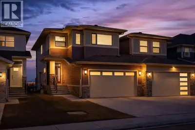 RARE FIND — ONLY THE GARAGE IS ATTACHED! ENJOY THE PRIVACY OF A DETACHED HOME WITH THE VALUE OF A HA...