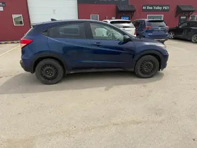 This is a 1.8L 4cylinder AWD SUV. It has Automatic Transmission, Remote Start, Reverse Camera, Power...