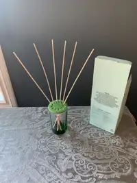 Partylite reed diffuser in green. 