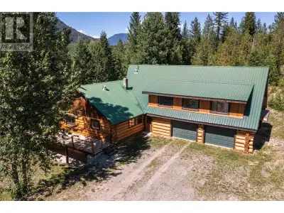 Private 3.29 acres, 4200+ sq.ft. finished log home of which there is a 1200 sq.ft bonus room newly f...