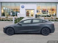 This Tesla Model 3 delivers a Electric engine powering this Automatic transmission. Window Grid Ante... (image 1)