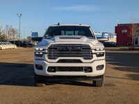 The 2026 Ram 3500 Laramie Crew Cab in Bright White combines heavy-duty capability with premium comfo... (image 9)