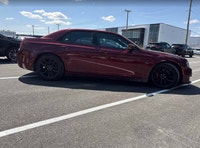 The 2023 Chrysler 300C in Velvet Red Pearl offers a commanding presence with exhilarating performanc... (image 2)