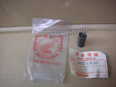 Have a Honda NOS throttle valve slide and spring # 16022-118-670 fits SL 70 KO K1 XL 70 KO to 1976 c...
