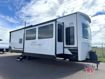 Forest River Sandpiper Destination Trailers 389HBFL highlights: King Bed Slide Bath and a Half Tripl...
