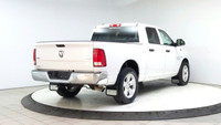 The Ram 1500 Classic SLT, presented in a striking white, is a robust and reliable 4x4 truck, ideal f... (image 4)
