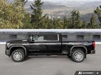 Delivering a colossal 470 horsepower and 975 lb-ft of torque, this 2024 GMC Sierra 3500HD SLT is pro... (image 1)