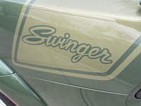 Introducing the dynamic 2023 Dodge Charger Scat Pack 392 Widebody in a striking green, complemented... (image 8)