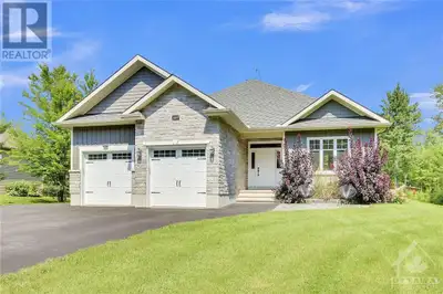 Stunning 2018 built custom bungalow on private 1.9+ lot just 5 minutes from Casselman. Beautifully l...