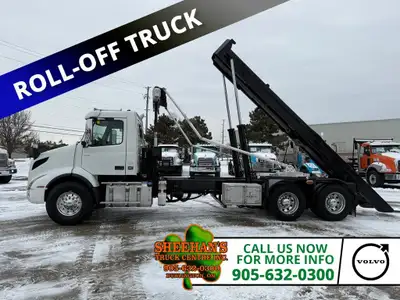 Tandem Roll-off truck with 406,265kms, Volvo D13 425Hp, I Shift (Severe Duty) 20,000lb front axle, 4...