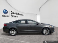 2018 Ford Fusion SE Vehicle Highlights Back Up Camera CarPlay Heated Seats Seamlessly navigate your... (image 6)