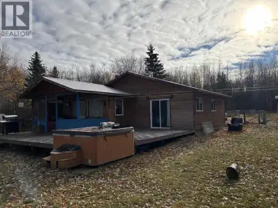 Escape to the tranquility of Nulki Lake with this cozy year-round cabin perfect for those seeking pe...