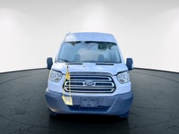 The 2017 Ford Transit Cargo Van in white with an automatic transmission and RWD drivetrain is specif... (image 2)