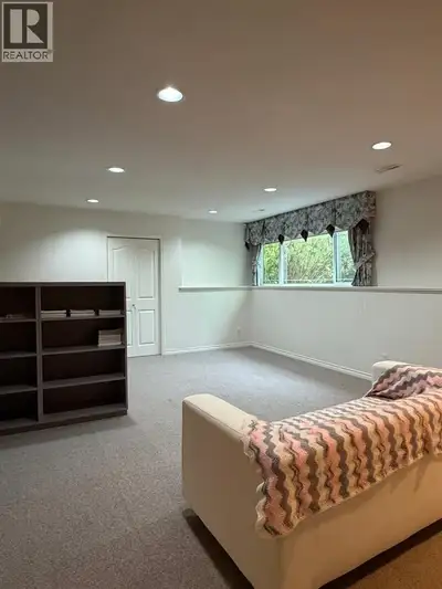 Furnished 3-bedroom, 1-bathroom basement suite in the desirable Westwood Plateau community of Coquit...