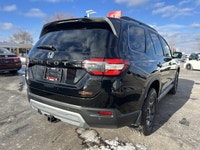 Designed for families who demand both rugged capability and refined comfort, the 2023 Honda Pilot Tr... (image 4)