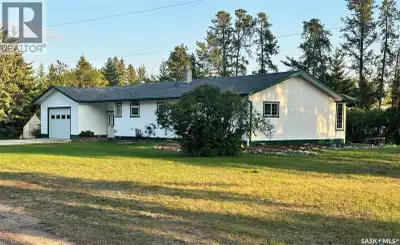 Welcome to this beautiful acreage offering 3.64 acres of peaceful living just a short walk from town...
