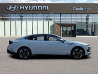 Step into sophistication with the 2025 Hyundai Sonata Preferred-Trend, featuring a luxurious panoram... (image 5)