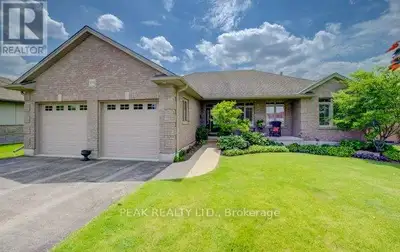 Welcome to this exceptional custom-built brick bungalow on a 0.38-acre lot offering over 3,000 sq. f...