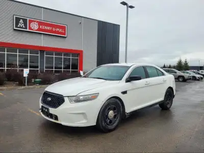"*AS-IS 2013 Ford Taurus Police in White. The vehicle has 208188km. The vehicle runs and drives ok....