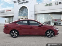 Recognized as an IIHS Top Safety Pick, this stunning red 2021 Nissan Sentra SV delivers safety and s... (image 6)