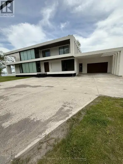 Experience modern luxury in this nearly 5,000 sq.ft. architectural masterpiece with breathtaking vie...