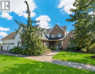 Beautifully maintained custom 2-storey home situated on 2 picturesque acres, surrounded by vineyards...