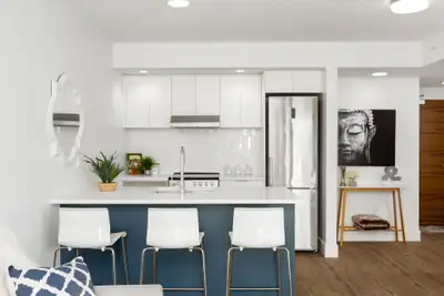 The Lonsdale offers a collection of one, two and three-bedroom pet-friendly* rentals. Each unit is e...