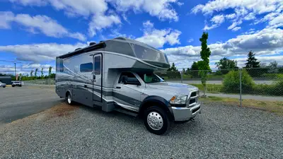 Very well built, equipped and maintained low mileage Super C motorhome on the heavy-duty Dodge 5500...