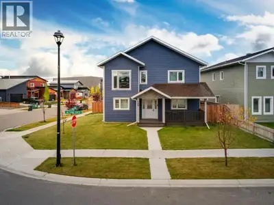 Great Opportunity awaits! Super Green 3-bedroom home with a legal one-bedroom suite on lovely fenced...