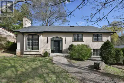 Impeccably renovated from top to bottom, this exceptional residence is nestled in the coveted Rattra...