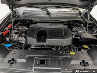 The 2023 Land Rover Defender 110 X-Dynamic SE AWD in stunning gray with an all-wheel-drive capabilit... (image 9)