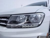 The pre-owned 2021 Volkswagen Tiguan Comfortline is a versatile and well-equipped SUV designed for d... (image 8)