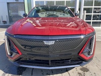 The 2026 Cadillac LYRIQ Signature Sport, finished in Radiant Red Tintcoat with a refined Oxford Ston... (image 1)