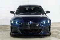 *English below* *Français:* Ce spectaculaire BMW i4 M50 xDrive Gran Coupé 2025, provenant d'un seul... (image 1)