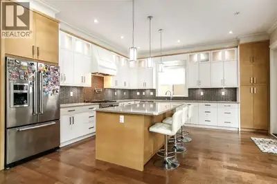 This stunning 4,500 SF home at 1132 Cloverley St sits on a flat 7,000 SF lot and boasts beautiful ci...