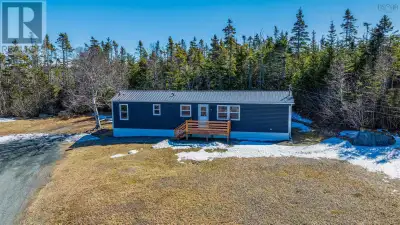 Coastal Living Made Easy! Discover this beautifully updated 2-bedroom, 1-bath mini home overlooking...