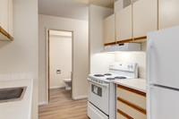 Amenities: Playground • In-suite Laundry • Guest Parking Suite & Building: Two- and three-bedroom bi... (image 7)